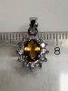 Fin slipad Citrin med 12 st små kristaller Nickelfri metall